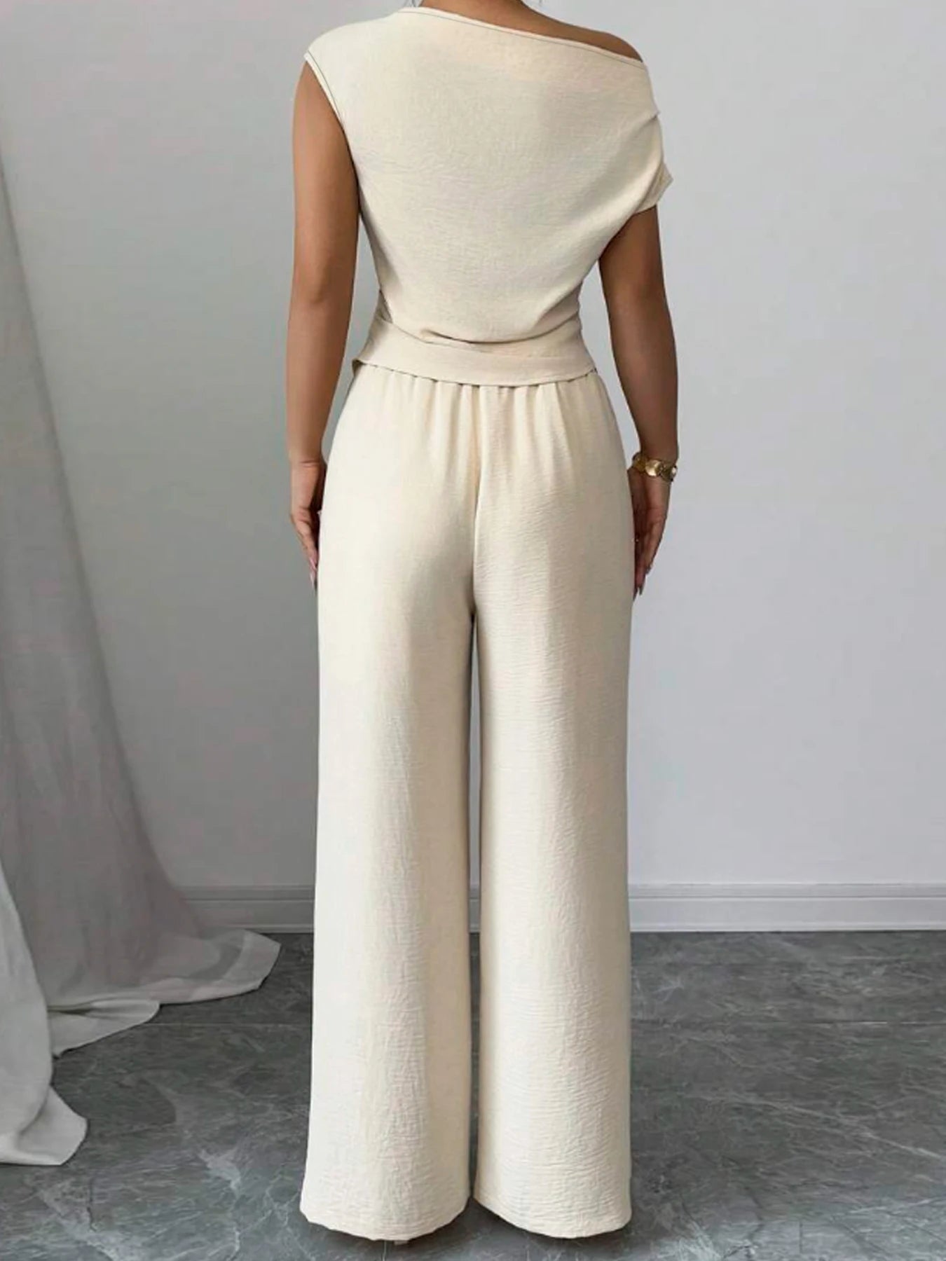 Women Elegant Polyester Asymmetric Top And Wide Leg Pants Set