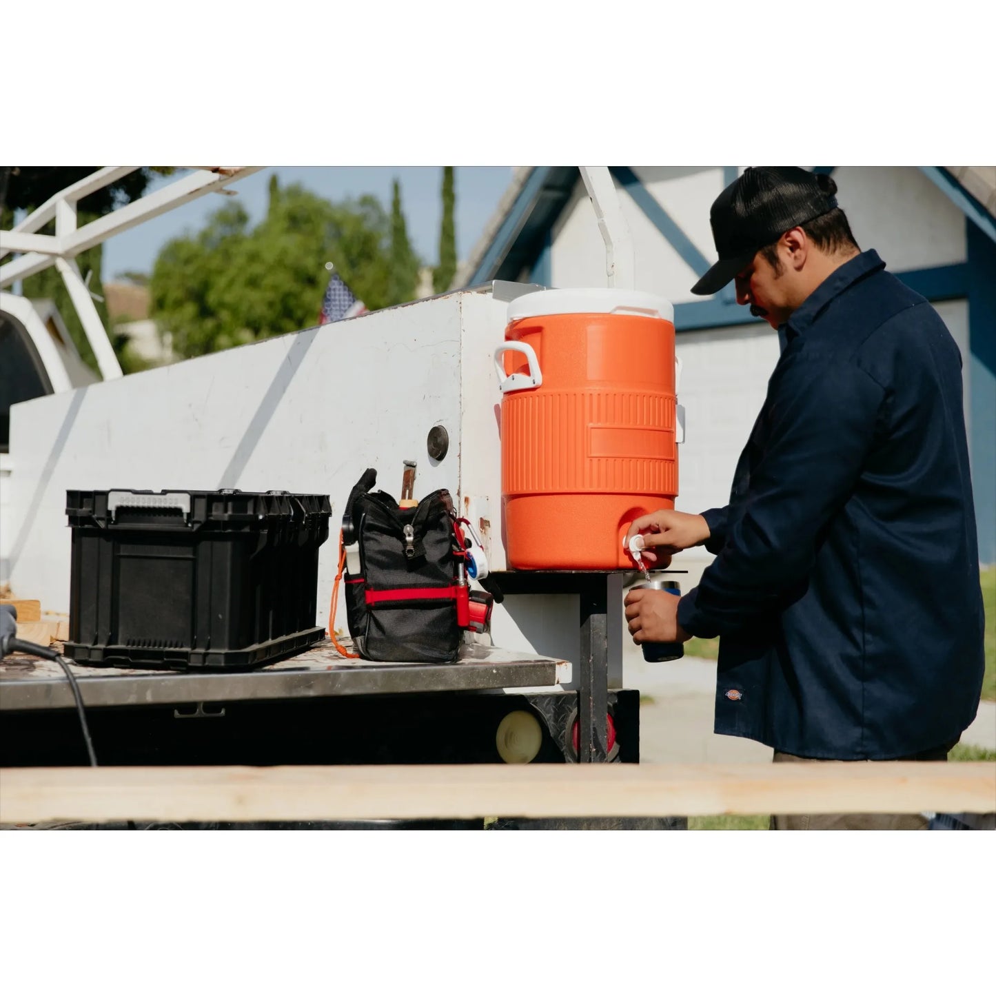 Heavy Duty Beverage Cooler Featuring Durable Plastic And Steel Trim